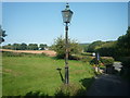 SO5573 : Lamp at St. Mary's Church (Caynham) by Fabian Musto