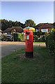 Post box with sun hat on Oak Hill