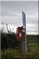 NZ3419 : Postbox on Folly Bank at Little Sainton by Ian S