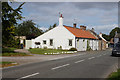 NZ2115 : Cottages on the B6275 at Piercebridge by Ian S