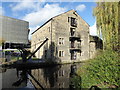 Huddersfield Narrow Canal and a converted warehouse