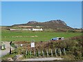 Foxhole Cottages with Carn Llidi behind from Whitesands carpark