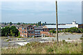 Derelict site awaiting housing development in Macclesfield, Cheshire