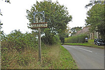 TM3669 : Sibton village sign and church by Adrian S Pye