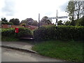 Elizabeth II postbox and fingerpost on The Street, Great Snoring