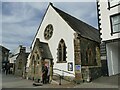 Busker outside a church