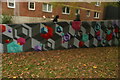 View of street art on the sloped walkway in the Webheath Estate from Netherwood Street #3