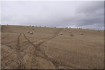 NH6853 : Stubble and round bales, Drum by Richard Webb