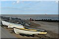 Boats on the beach at Cobbolds Point