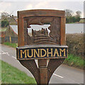 TM3297 : Mundham village sign by Adrian S Pye