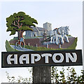 TM1796 : Hapton village sign by Adrian S Pye