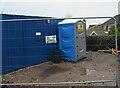 Portable toilet at the edge of a building site, Pillmawr Road, Newport