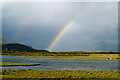 SH5738 : Rainbow over Traeth Mawr by Jeff Buck