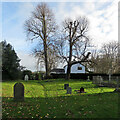TL4945 : Hinxton: the north side of the churchyard by John Sutton