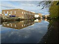 Building reflected in the canal