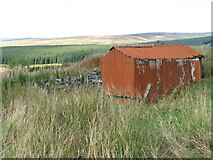 NS6815 : Rusty shed on old quarry near Lethans by Chris Wimbush