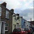 Terraced houses with Christmas trees in Bampton