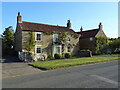 Wisteria adorned cottage in Bulmer