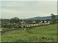 Train between Ben Rhydding and Burley-in-Wharfedale