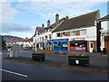 Shops and takeaways on the corner of Alcombe Road