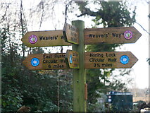 TG3427 : Signpost at entrance to Weavers Way at East Ruston by David Pashley