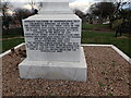 Inscription on the base of the memorial to munitions workers in Erith Cemetery