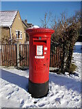 TF1505 : EIIR postbox at Glinton Post Office in the snow by Paul Bryan