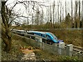 Gelderd Road rail access point with passing train