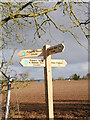 TG2728 : Footpaths Signpost by David Pashley
