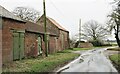 SE6764 : Barns at Lilling Hall Farm by Gordon Hatton