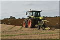 Ploughing stubble near Fen Farm