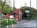 Elizabeth II postbox and telephone box on Tout Hill, Whitwell-on-the-Hill