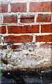 Benchmark on The Running Horse pub, Alfreton Road (Cromwell Street face)