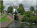 SO8986 : Stourbridge Locks No 10 and 9 with cottage near Buckpool, Dudley by Roger  Kidd