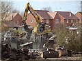 Demolishing the old farm bridge over Cuttle Brook