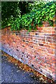 Cemetery wall on SE side of Cromwell Street