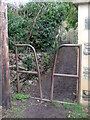 Metal bars on the path by Kingsfield Farm