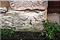 NY4828 : Old benchmark on jamb of building at Hall Bank by Roger Templeman