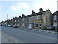 Shops and houses on New Road Side