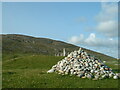 NL6395 : A cairn of sea-rounded rocks by David Medcalf
