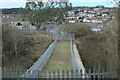 Enclosed railway footbridge