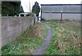 Footpath round gate at Lodge Farm from east