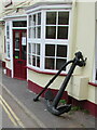 Anchor attached to the wall of the Ship Inn, Teignmouth