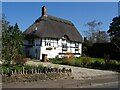 Thatched timber-framed cottage