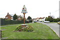 TF8606 : North Pickenham village sign by Adrian S Pye