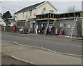 Three ladders on the wall of a convenience store in Llanharry