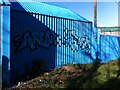 Corrugated metal shed painted sky blue