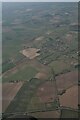 Cropmarks on field at Asterby, with Scamblesby above: aerial 2021