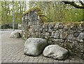 Boulders beside the wall