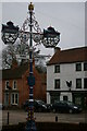 SK7371 : Commemorative signpost and lamp standard, Tuxford by Christopher Hilton